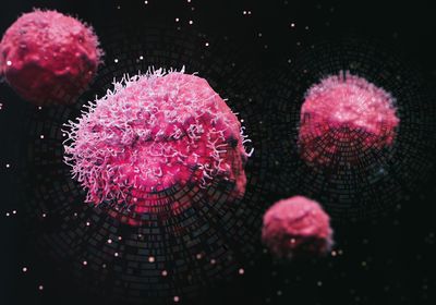 Composite image showing genes radiating from tumor cells