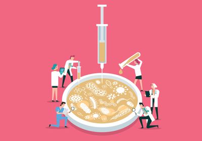 Conceptual illustration of researchers studying microbes in a petri dish.